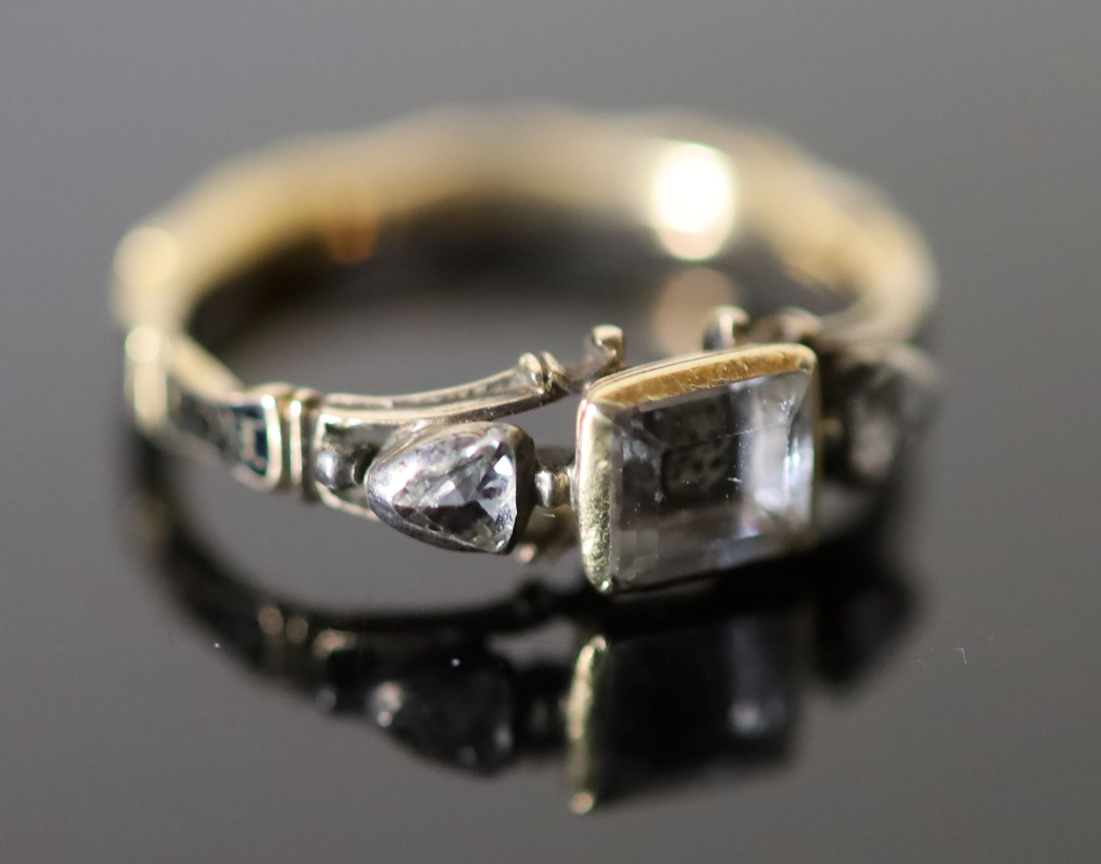 An early George II gold, rock crystal rose cut diamond and black enamel memento mori ring,